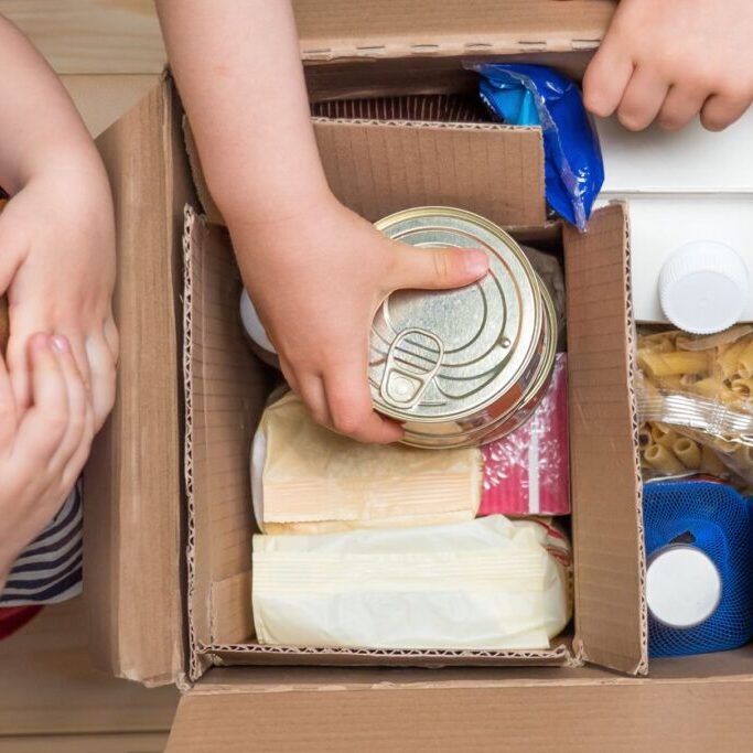 children-opening-food-box